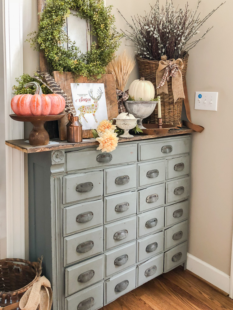 apothecary cabinet decorated for fall-1