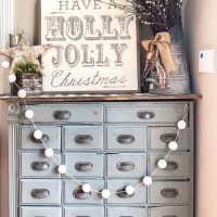 Vintage Christmas Decor apothecary cabinet
