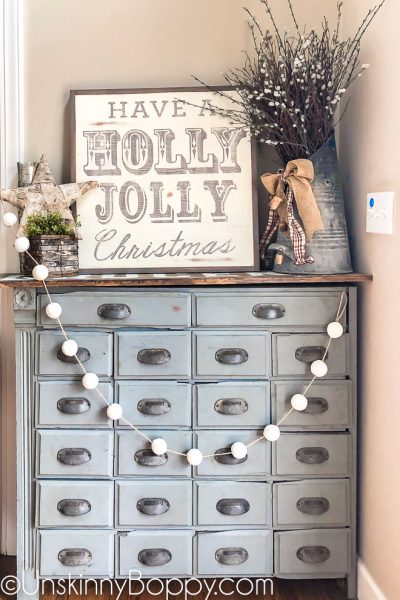 Vintage Christmas Decor apothecary cabinet