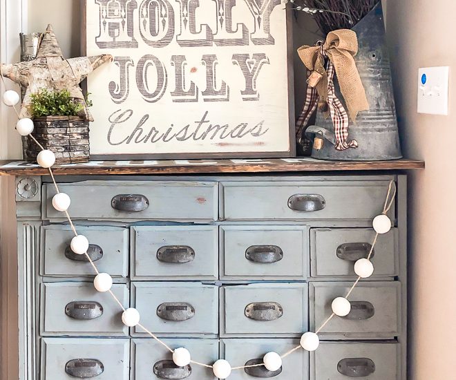 Vintage Christmas Decor apothecary cabinet