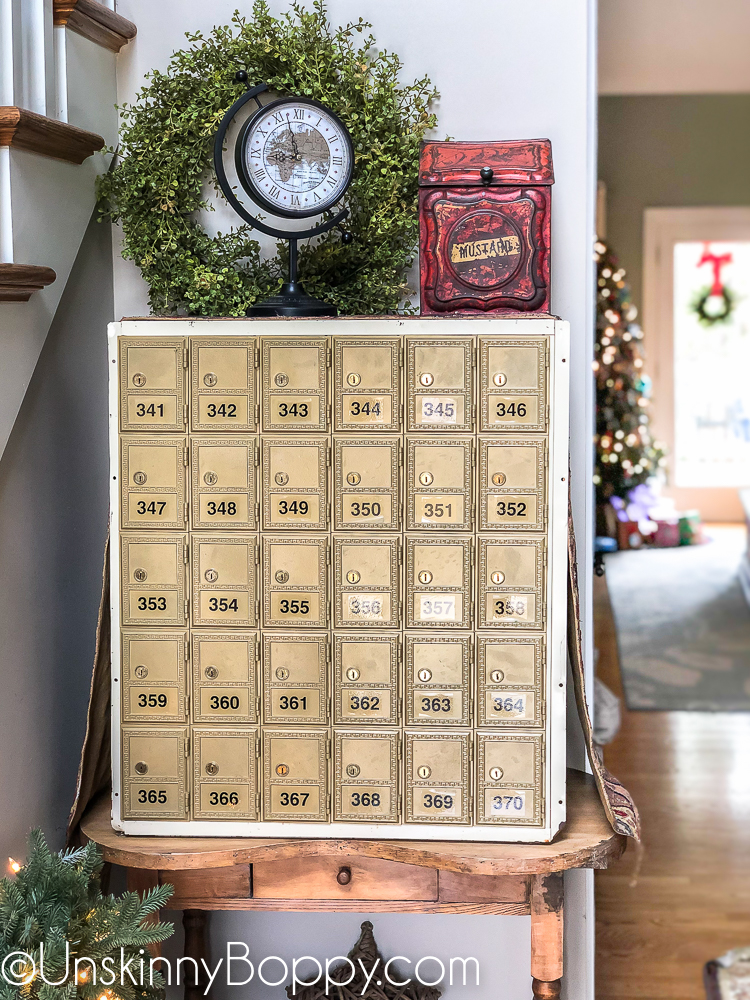 Vintage mailbox used as foyer decor