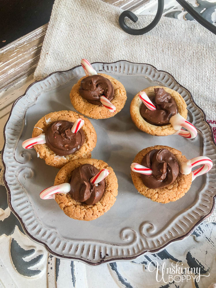 Hot Chocolate Cookie Cups with candy cane handles