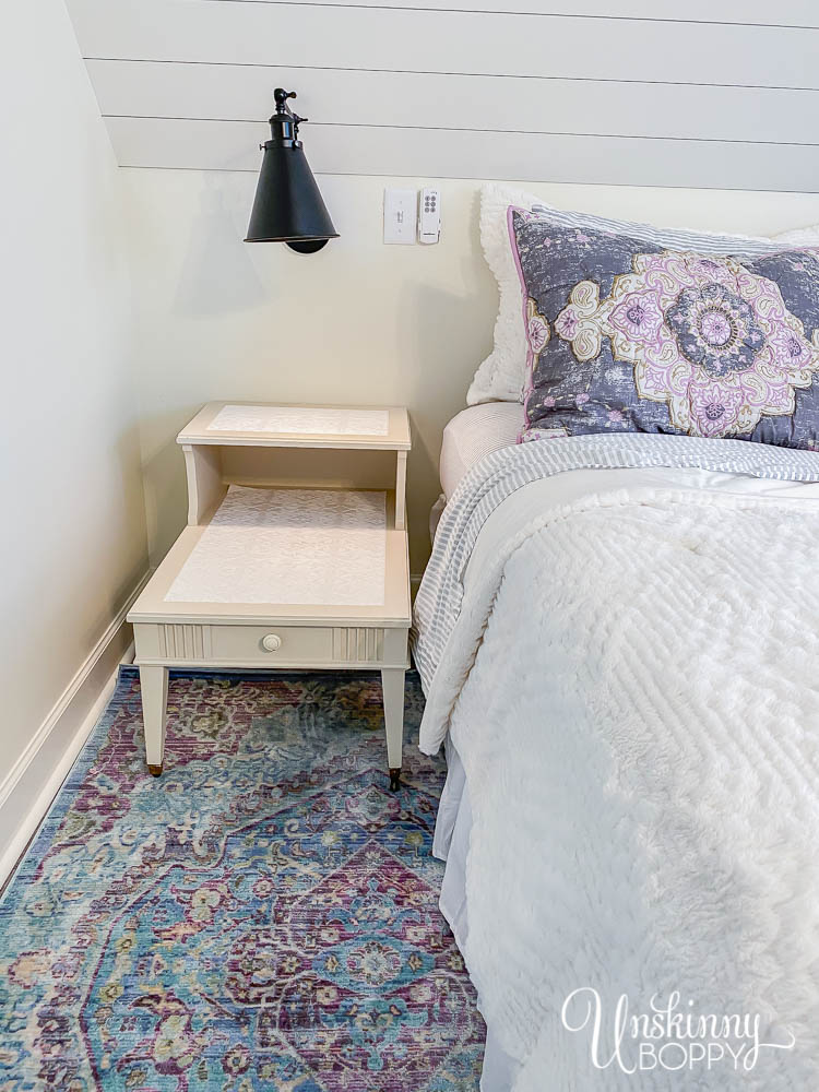 Dreamy loft bedroom makeover with Bohemian vibe, shiplap and aqua/purple rug
