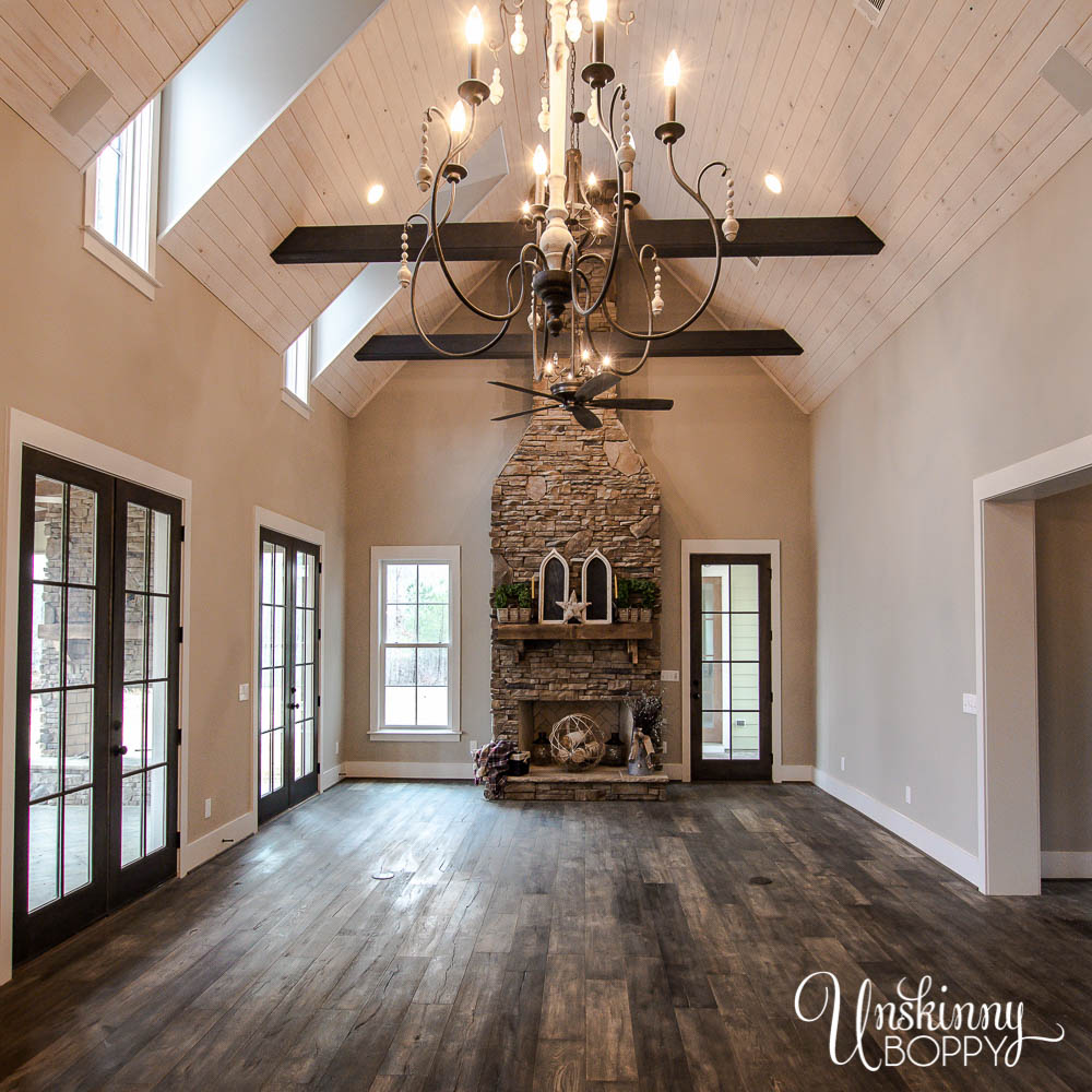 Stacked stone fireplace in vaulted ceiling